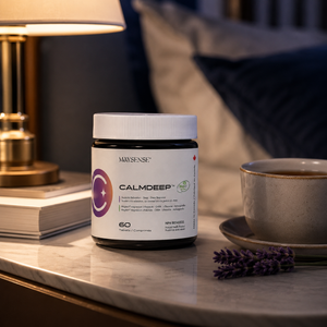 CalmDeep supplement bottle on a warm evening bedside table with tea lavender and soft bedroom lighting