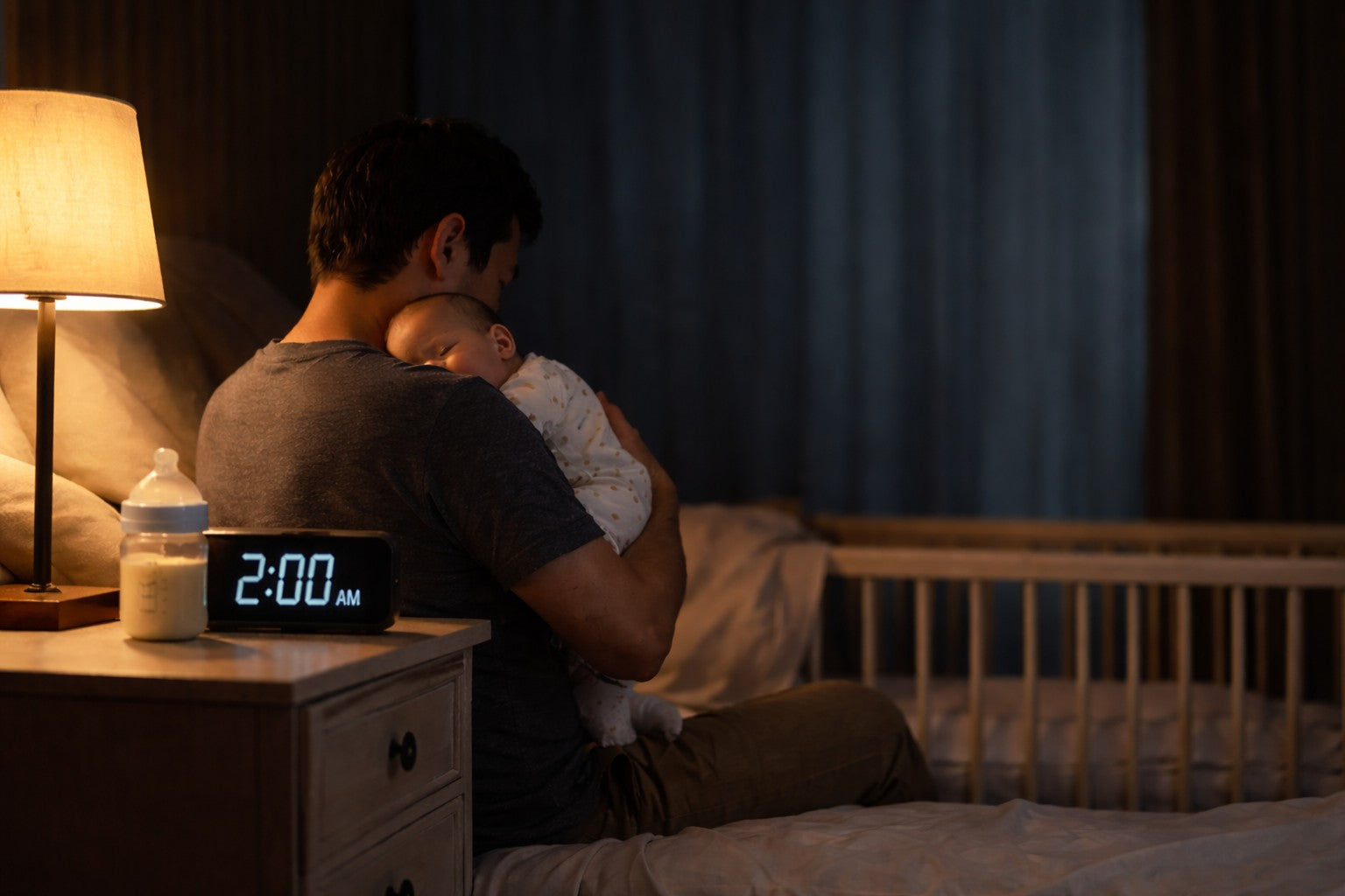 Hank, founder of Maysense, holding his newborn baby in Vancouver