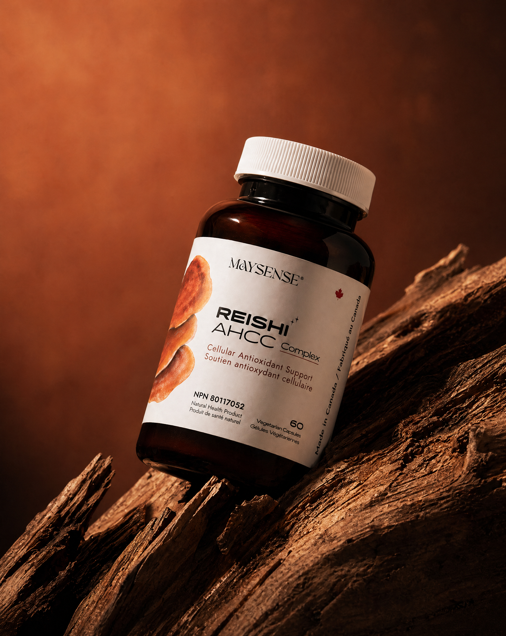 Bottle of Reishi AHCC complex on a wooden surface with a brown background